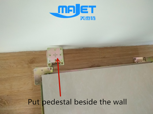 Put raised floor pedestal beside the wall